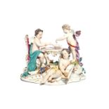 A Meissen figure group c.1765-70, of three putti beside a table, one blindfolded and drawing lots