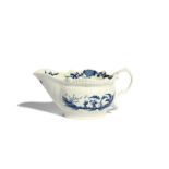 A Worcester blue and white sauceboat c.1770, painted with the Two Porter Landscape pattern, the