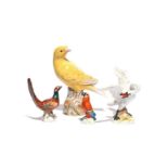 Three miniature Meissen models of birds 20th century, including a pheasant, a parrot and a swan with