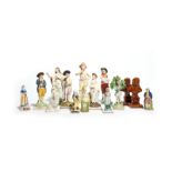 A large group of Staffordshire figures 19th century, including two treacle-glazed busts of a