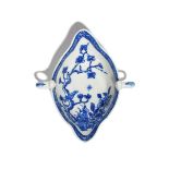 A rare Bow blue and white two-handled sauceboat c.1750-52, painted in a bright blue with a bird