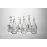 Six decanters and stoppers late 18th/19th century, of Prussian and mallet form, variously engraved