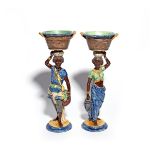 A large pair of Continental Majolica sweetmeat figures 19th century, each modelled as a standing