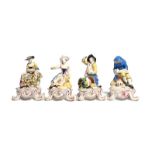 A set of Bow figures of the Rustic Seasons c.1765, each modelled seated on a tall footed base,