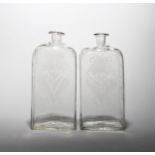 A large pair of Dutch or Bohemian glass spirit flasks c.1740, of flattened rectangular form with