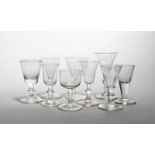 Nine small glasses 18th/19th century, with drawn trumpet, bucket and bell bowls raised on plain,