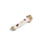 A gold-mounted English porcelain dog whistle late 18th/19th century, simply decorated with leaf