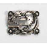 A Georg Jensen silver brooch designed by Arno Malinowski, model no 204, cast in low relief with a