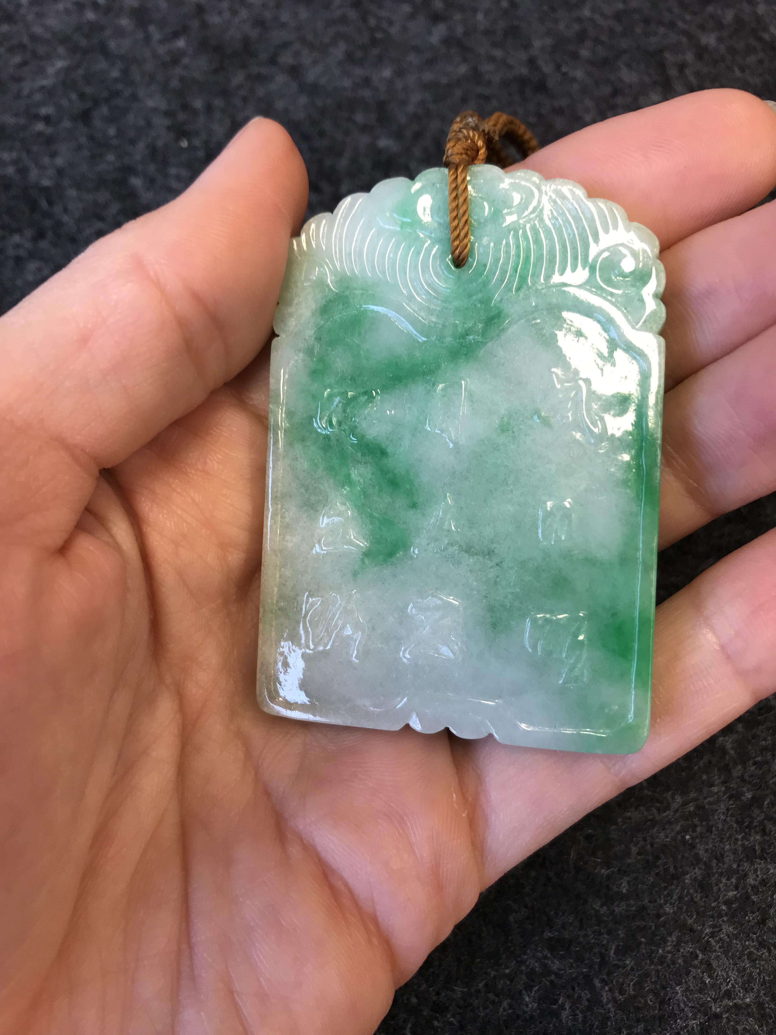 A CHINESE APPLE GREEN JADEITE RECTANGULAR PENDANT QING DYNASTY OR LATER Carved in low relief to - Image 10 of 26