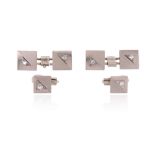 A pair of square diamond-set cufflinks, with textured and plain decoration surmounted with a