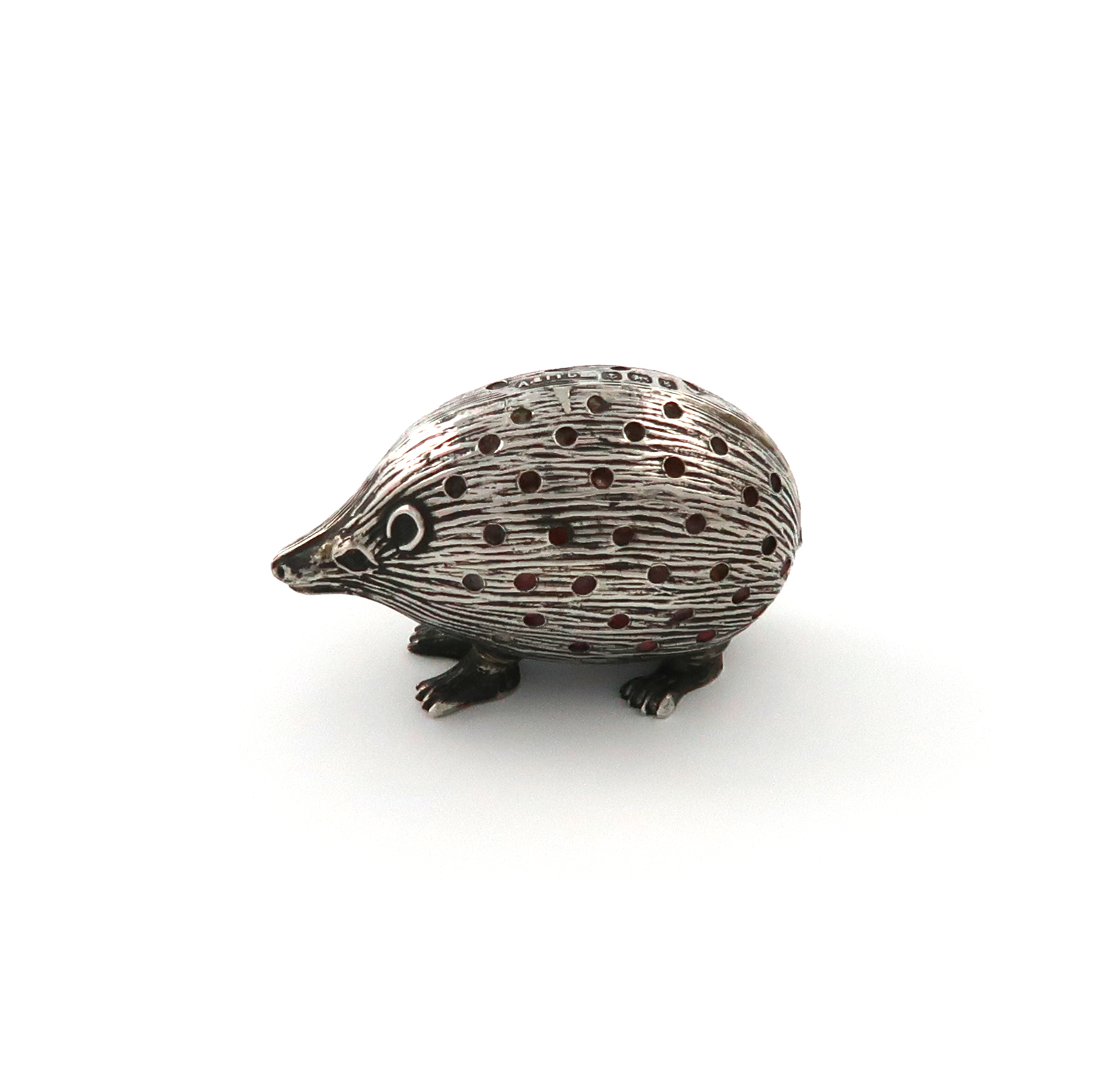 An Edwardian novelty silver hedgehog pin cushion, by Adie and Lovekin, Birmingham 1906, modelled