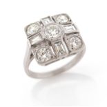 A square diamond cluster ring, millegrain-set with graduated round brilliant-cut and baguette-shaped