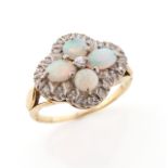 An opal and diamond cluster ring, set with cabochon opals and circular-cut diamonds in gold, size