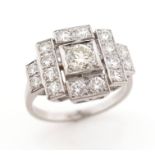 A square diamond cluster ring, millegrain-set with graduated round brilliant-cut diamonds in pierced
