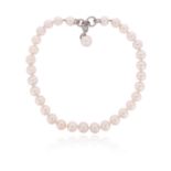 A South Sea cultured pearl necklace, the 31 matched white pearls terminate with oval links and a