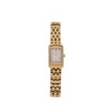 A lady's gold wristwatch by Longines, the signed white rectangular dial with Arabic and baton