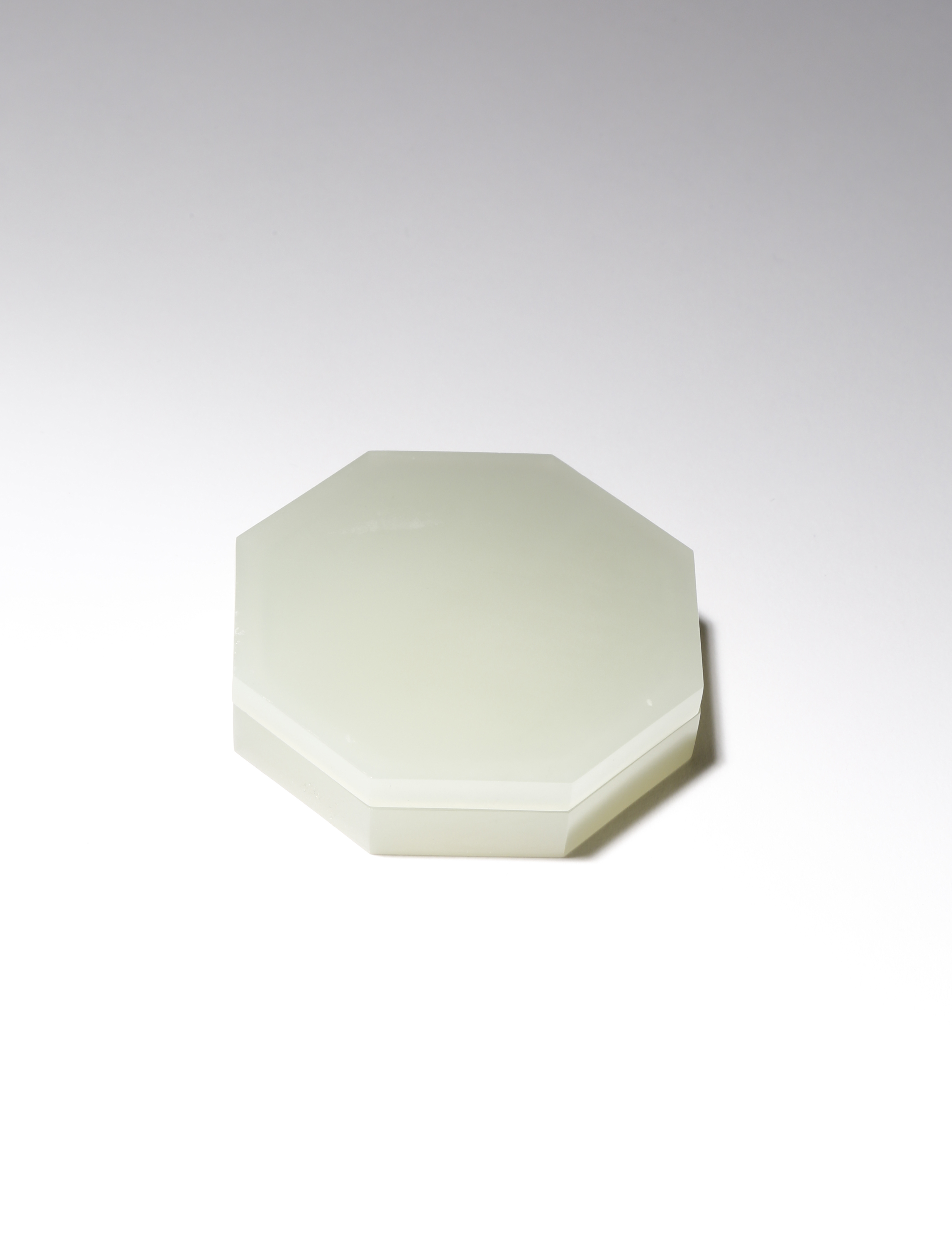 A SMALL CHINESE PALE CELADON JADE OCTAGONAL SEAL PASTE BOX AND COVER QING DYNASTY OR LATER The plain