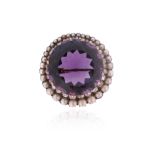 A Victorian amethyst, diamond and seed pearl brooch pendant, the circular-cut amethyst set within an