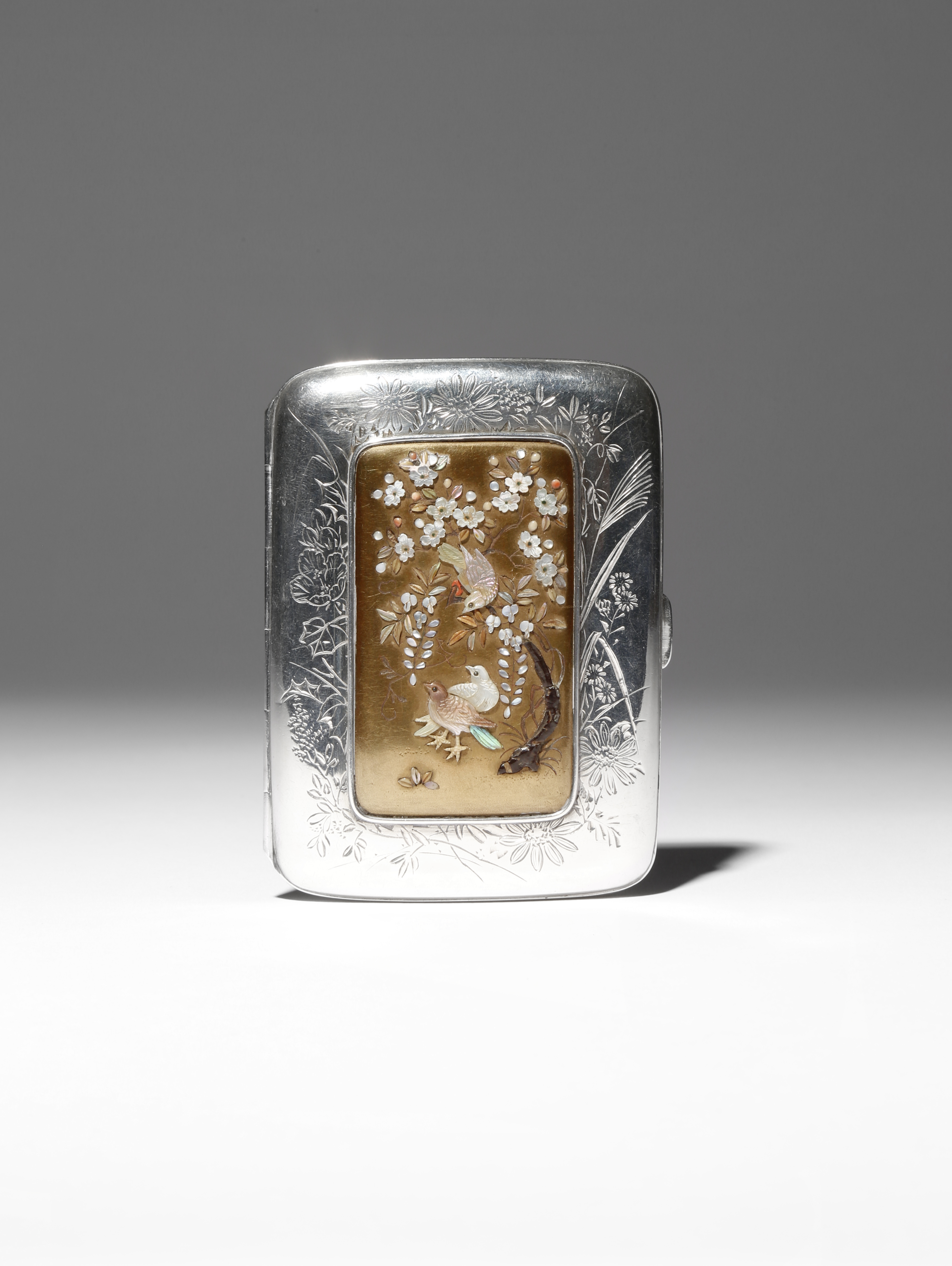 A JAPANESE SHIBAYAMA-STYLE SILVER CASE MEIJI PERIOD, 1868-1912 The rectangular panel to the front