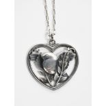 A Georg Jensen silver pendant necklace designed by Arno Malinowski, model no.97, heart-shaped,