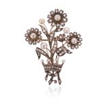 A late 19th century floral brooch, the stylised posy and coronet set with rose-cut diamonds and