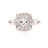 A diamond cluster ring, the cushion-shaped diamond weighs 2.50cts, D, IF