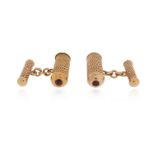 A pair of gem-set gold cufflinks, the cylindrical links with ropetwist decoration and terminated