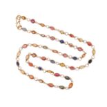 A sapphire set yellow gold chain necklace, set with assorted sapphires in spectacle gold mounts,