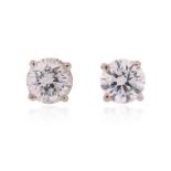 A pair of diamond stud earrings, the round brilliant-cut diamonds weigh approximately 1.00cts total,