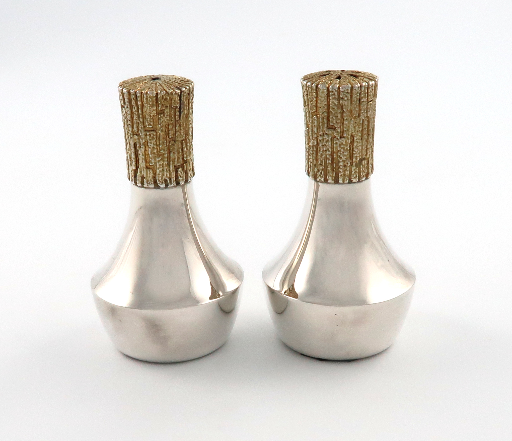By Christopher Lawrence, a pair of modern parcel-gilt salt and pepper pots, London 1982, tapering