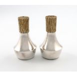 By Christopher Lawrence, a pair of modern parcel-gilt salt and pepper pots, London 1982, tapering