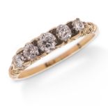 A Victorian diamond five stone ring, set with graduated old circular-cut diamonds in carved and