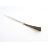 By Stuart Devlin, a modern parcel-gilt silver letter opener, London 1973, tapering form, raised