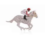 A diamond and enamel horse and jockey brooch, the stylised horse is pavé-set with diamonds, the