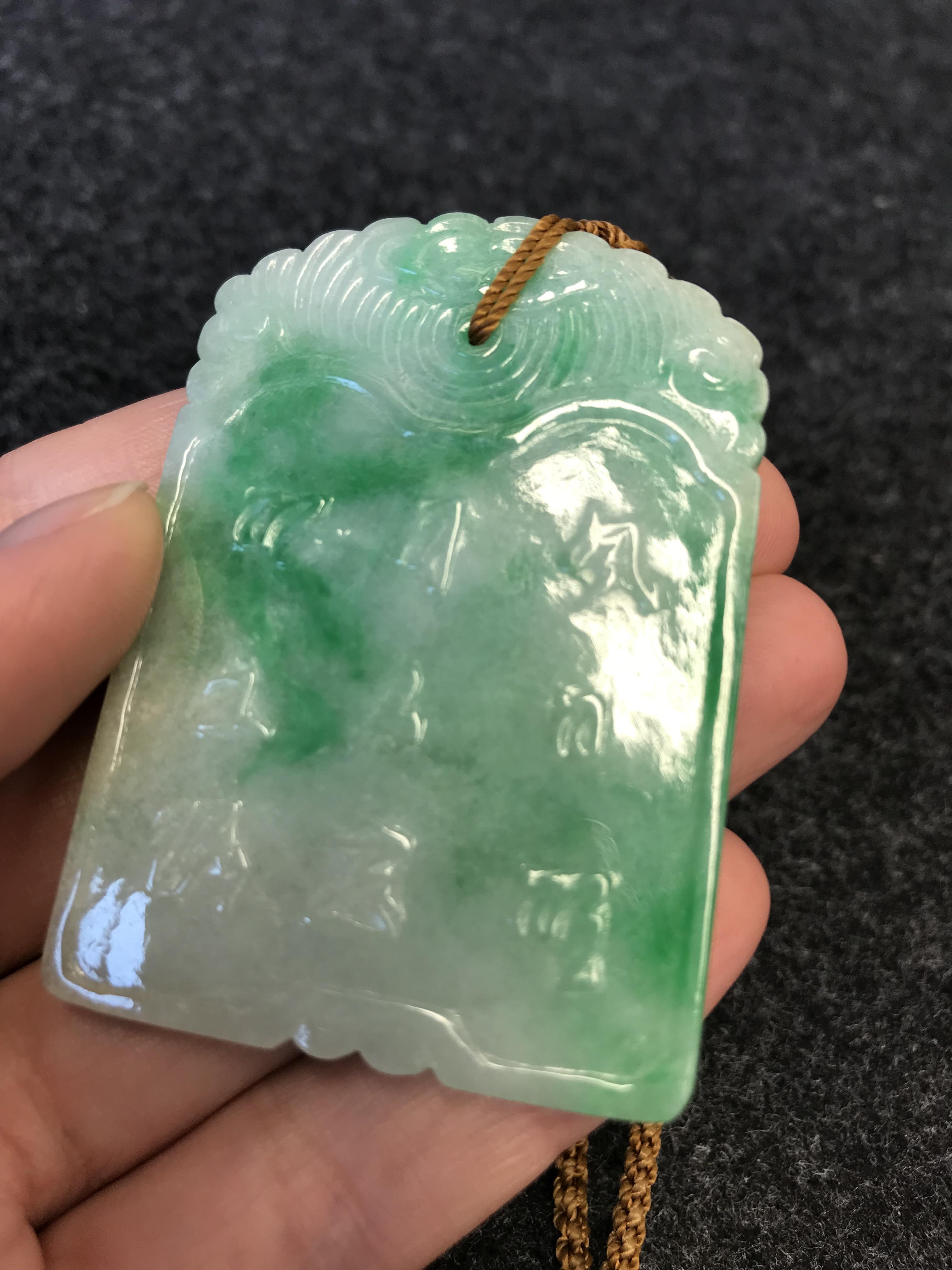 A CHINESE APPLE GREEN JADEITE RECTANGULAR PENDANT QING DYNASTY OR LATER Carved in low relief to - Image 24 of 26