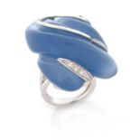 A chalcedony and diamond ring by Geoffrey Rowlandson, the carved blue chalcedony is mounted with