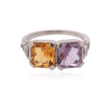 An amethyst and citrine ring, the square shaped amethyst and citrine are set within old cushion-