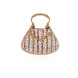 A diamond-set handbag charm / pendant, the stylised bag set with round brilliant-cut diamonds in