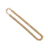 A fancy link gold necklace, with fluted circular links in yellow gold, 52cm long, 40g