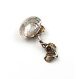 A Victorian parcel-gilt cast silver caddy spoon, by Francis Higgins, London 1890, shell bowl, with a