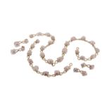 A freshwater cultured pearl and gold parure by Tiffany & Co., comprising a necklace, bracelet,