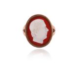 A hardstone cameo-mounted gold ring, the cameo depicting Sir Walter Scott, with bifurcated shoulders