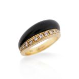 An onyx and diamond ring, set with graduated round brilliant-cut diamonds and carved onyx in
