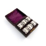 A set of six silver napkin rings, by The Goldsmiths and Silversmiths Company, Sheffield 1921,