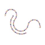 A sapphire and diamond necklace and matching bracelet, alternately set with oval-shaped vari-