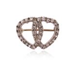 A Victorian diamond-set double heart brooch, set with old circular-cut diamonds in silver on gold,