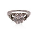 A diamond solitaire ring, the round brilliant-cut diamond weighs approximately 1.20cts, with diamond