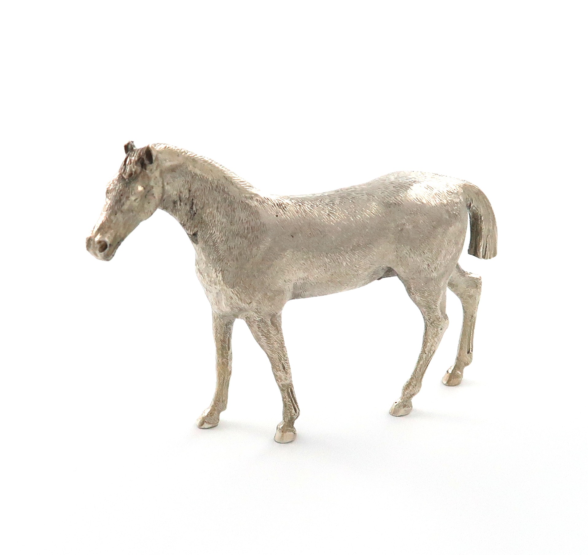 A silver model of a standing horse, by Richard Comyns, London 1974, modelled in a standing position,