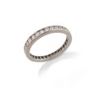 A diamond full-circle eternity ring by Tiffany & Co., the round brilliant-cut diamonds channel-set