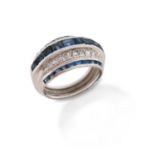 A sapphire and diamond bombé ring, set with graduated calibre-cut sapphires and circular-cut